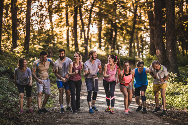 istock Large group of runners on a starting line ready for marathon race. 860136882