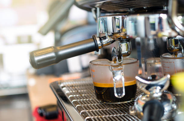 istock Coffee machine making espresso shot in a cafe shop 860136978