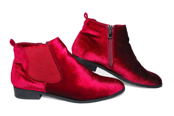 istock Lady's red velvet ankle boots isolated on white background. 860137028
