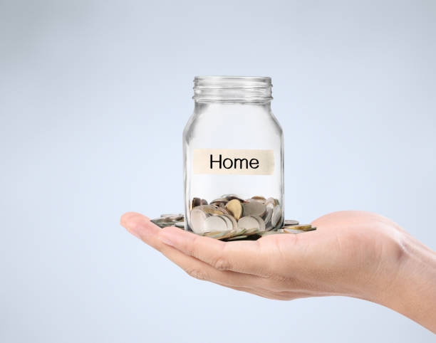 istock glass piggy  bank from  hand 860137636