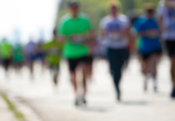 istock Marathon out runners people 860138080