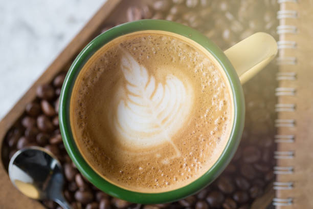 istock Cup of coffee with beautiful Latte art Selective focus 860138084