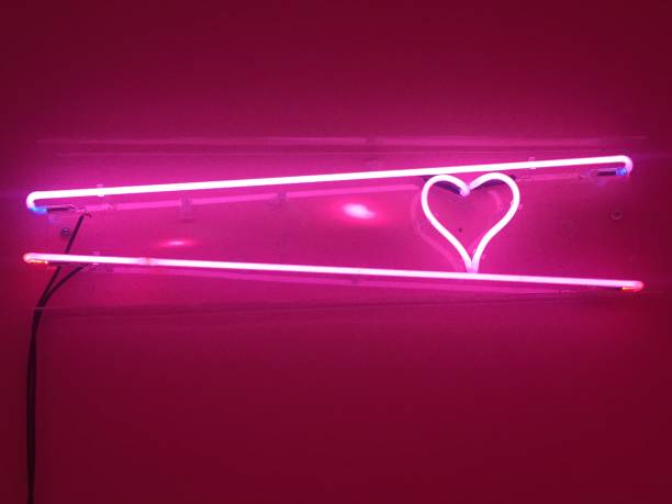 istock pink neon light wall decor girlie 860138398