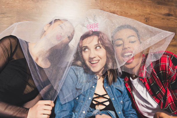 istock multicultural young women at hen party 860141428