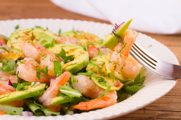 istock Shrimp salad with avocado arugula, scallion and almonds 860145104