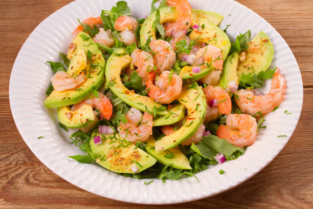 istock Shrimp salad with avocado arugula, scallion and almonds 860145814