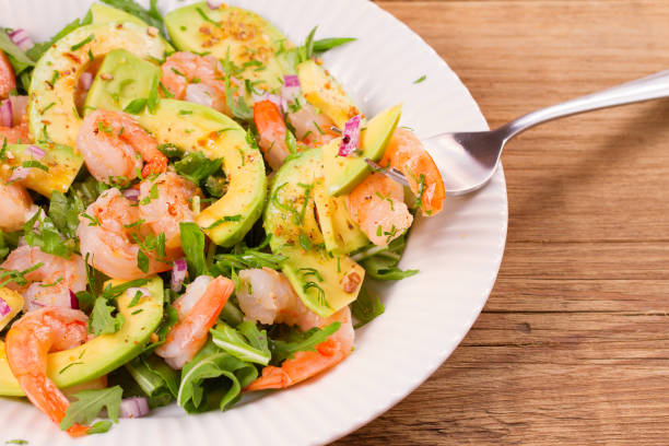 istock Shrimp salad with avocado arugula, scallion and almonds 860149792