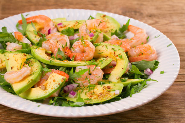istock Shrimp salad with avocado arugula, scallion and almonds 860152134