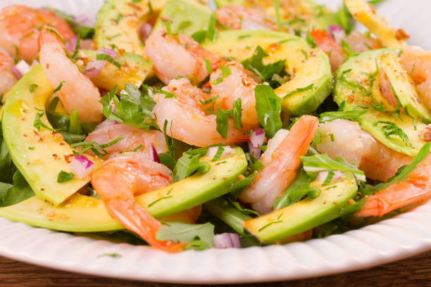 istock Shrimp salad with avocado arugula, scallion and almonds 860155568