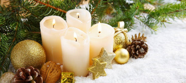 istock Four burning advent candles and Christmas decoration 860161140