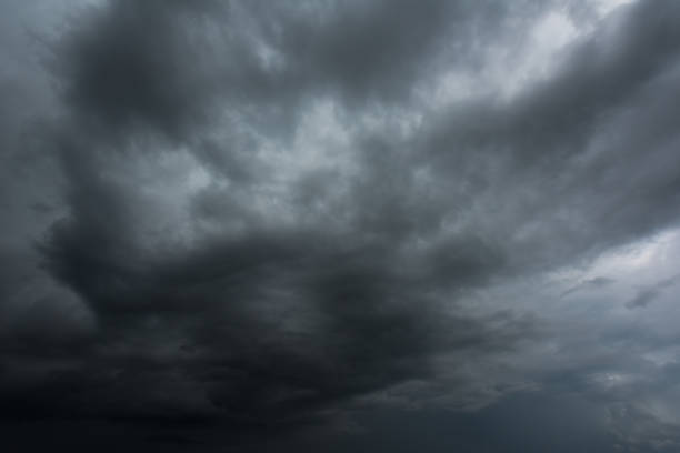 istock Black cloud and thunderstorm before rainy, Dramatic  black clouds and dark sky 860161434