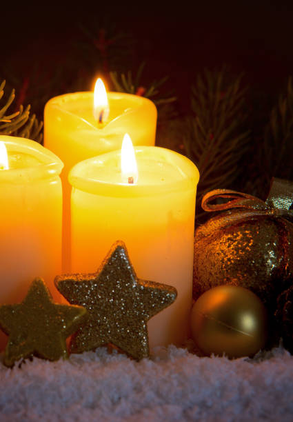 istock Two burning advent candles and Christmas decoration 860164120