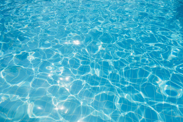 istock Ripple Water in swimming pool with sun reflection 860165764