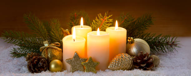 istock Christmas decoration and four burning Advent candles 860168514