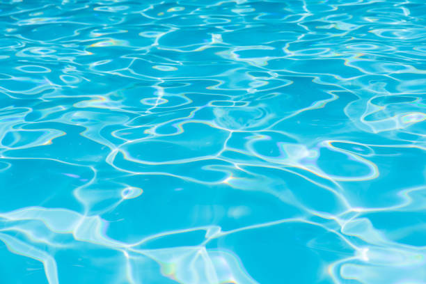istock Beautiful ripple wave and blue water surface in swimming pool, Blue water surface for background 860169372