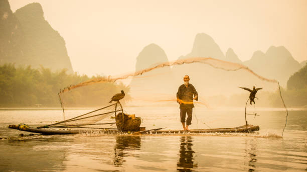 istock River Lee Cormorant Fisherman 860172228