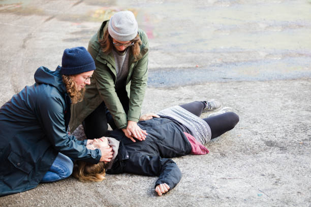 istock Two woman performing reanimation 860176004