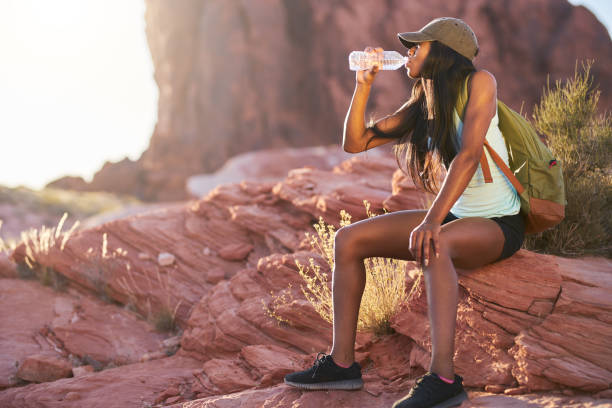 istock woman taking a break to drink water 860191868