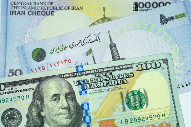 close up banknote and currency bills and coins - iranian currency imagens e fotografias de stock