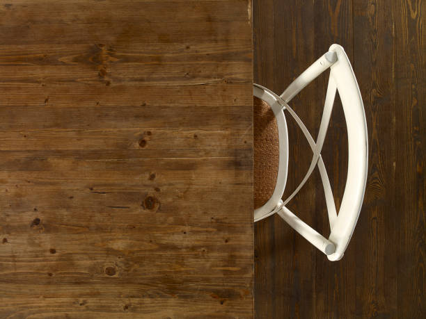 Dining table Looking down on a wooden dining table and chair restaurants tables and chairs stock pictures, royalty-free photos & images