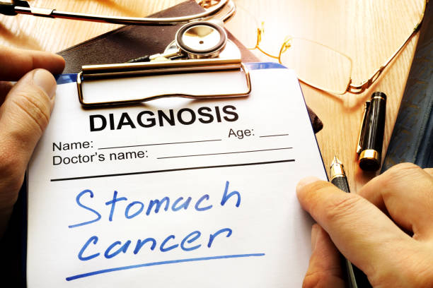 stomach cancer diagnosis on a diagnostic form. - cancro gástrico imagens e fotografias de stock