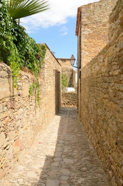 istock Narrow stone alley 860206626