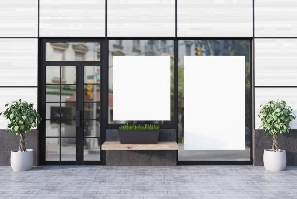 istock White cafe exterior with two posters 860221384