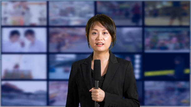 istock Female news anchor in studio 860221580
