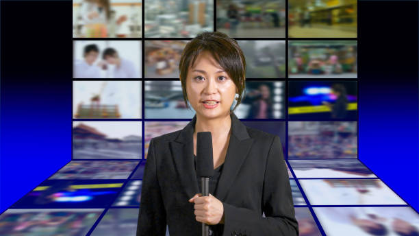 istock Female news anchor in studio 860221874