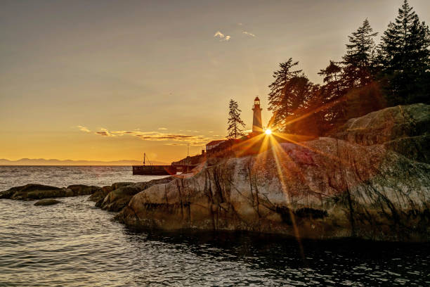 Lighthouse at sunset, Lighthouse Park, West Vancouver, BC Lighthouse at sunset, Lighthouse Park, West Vancouver, BC west vancouver stock pictures, royalty-free photos & images