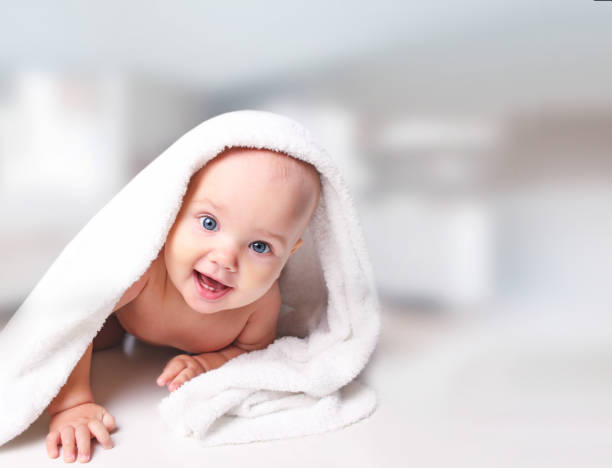 istock Baby portrait in towel. 860231894