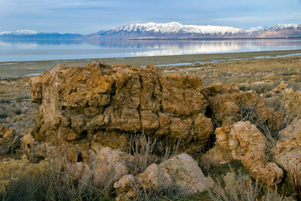 istock Foreground Boulders and Distant Mountains at Antelope Island SP 860232766