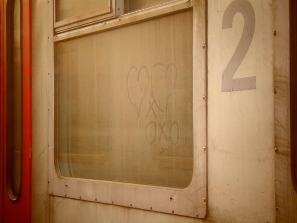 istock Romantic hearts drawn on a dirty train window 860236934