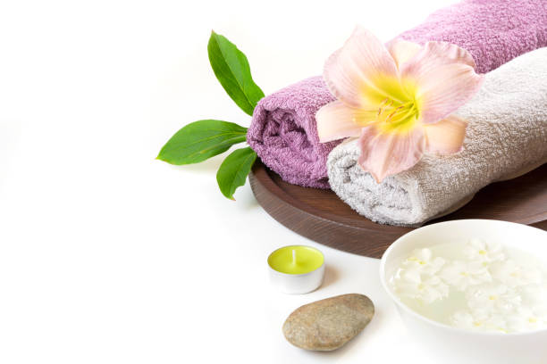 istock Spa setting of towel, flower isolated on white background with copy space. 860242860