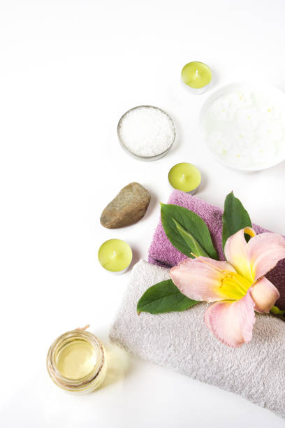 istock Spa setting of towel, flower isolated on white background with copy space. 860243052