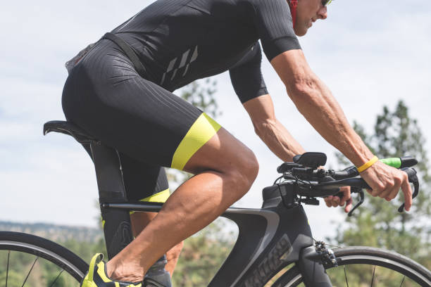istock Triathlete cycling on a bicycle 860243570