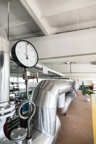 istock Round mechanical pressure gauges on pipelines 860243642