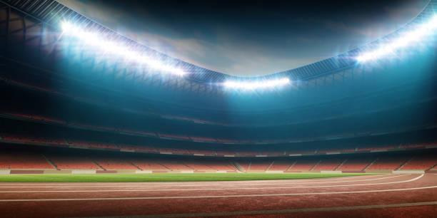 istock soccer stadium with running track 860246724