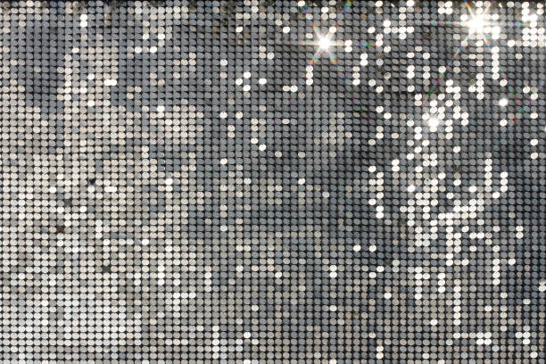 mosaico d'argento con macchie luminose e stelle - tinsel foto e immagini stock