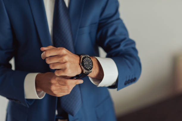 istock The man fastens the watch on his hand 860251086