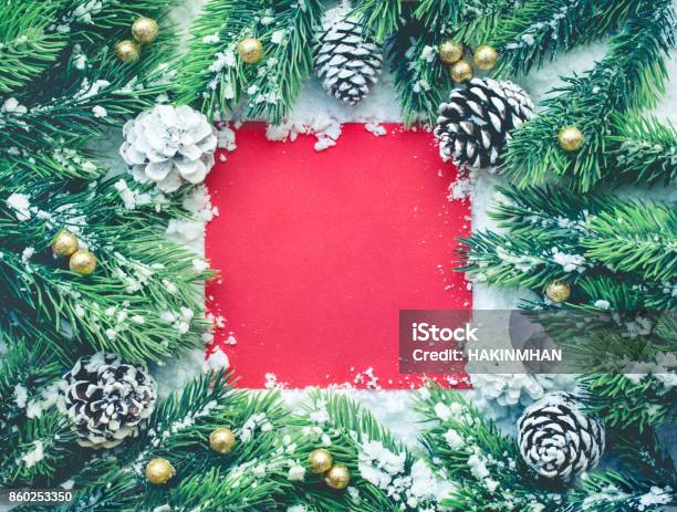 Christmas Ornament With Pine Branchred Card On Snow Stock Photo - Download Image Now