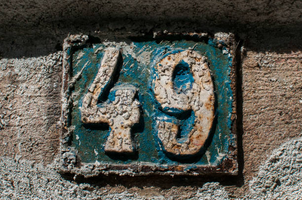 istock Old retro cast iron plate number 49 860253908