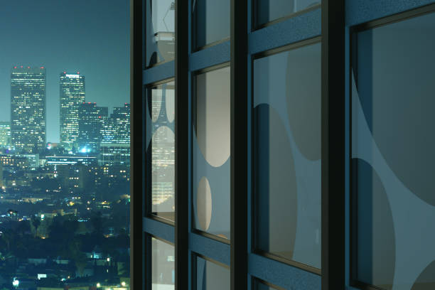 istock Abstract glass building in night city 860260612