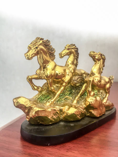 istock Statuettes of three horses 860261018