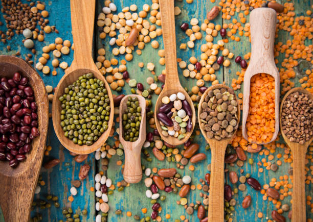 istock Raw legume on old rustic wooden table 860263950