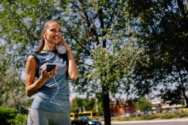 istock Beautiful young woman ready for training in nature 860264402