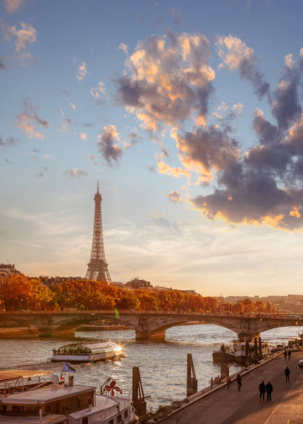 istock Paris with Eiffel Tower against colorful sunset in France 860268432