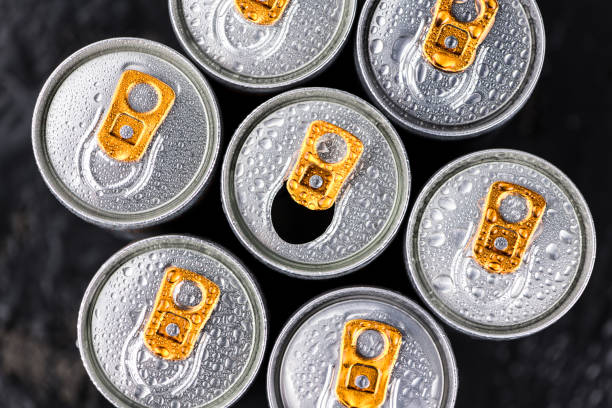 Some Energy Drinks on a dark slate slab Some fresh Energy Drinks on a vintage slate slab, selective focus, close-up shot energy drink stock pictures, royalty-free photos & images