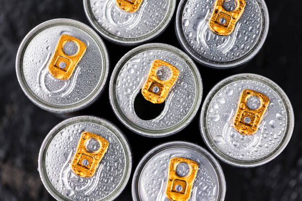 Some Energy Drinks on a dark slate slab Some fresh Energy Drinks on a vintage slate slab, selective focus, close-up shot energy drinks stock pictures, royalty-free photos & images