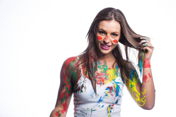 istock Close up of brunette model covered in liquid paint 860295004